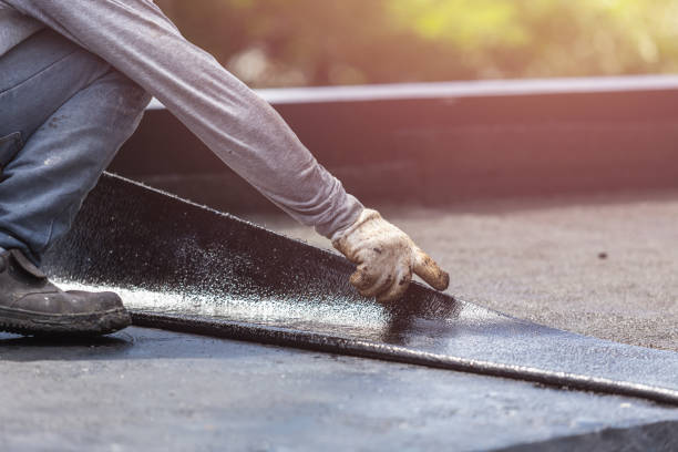 Professional Basement Waterproofing technician working in Delton, MI